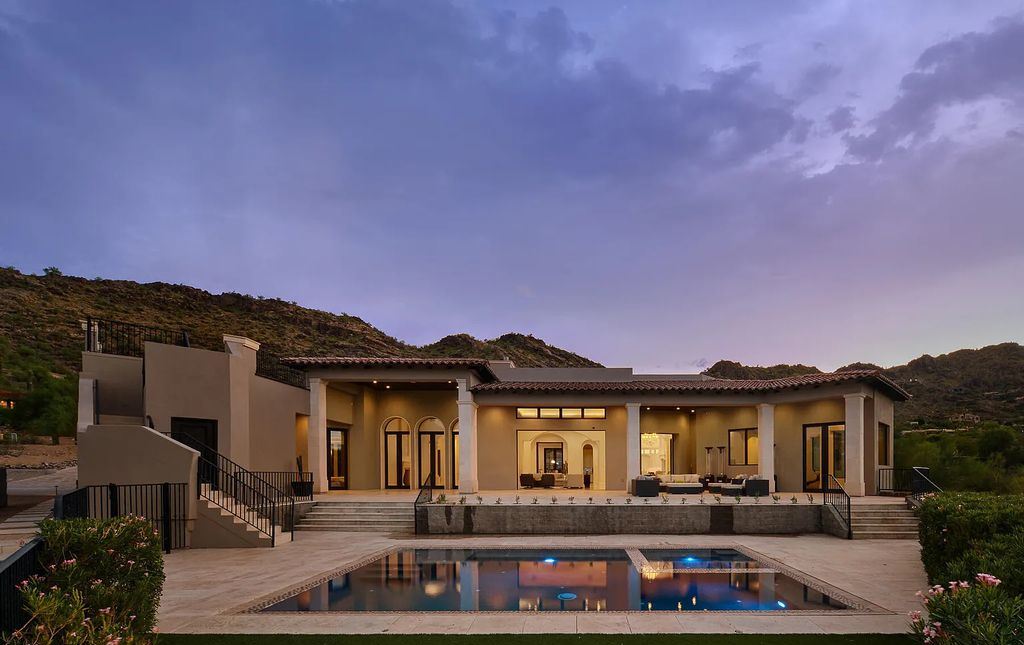 The Estate in Paradise Valley, a phenomenal property has exquisite natural limestone & hardwood flooring throughout, oversized elder wood doors and custom millwork and tile is now available for sale. This home located at 6112 E Quartz Mountain Rd, Paradise Valley, Arizona