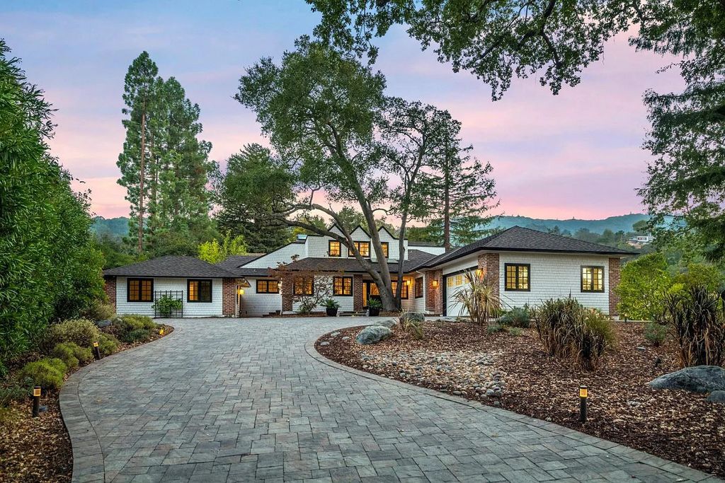 18544 Beck Ave, Monte Sereno, California is a beautifully remodeled house nestled among majestic oak and pine trees with both natural & manicured landscape offers a serene setting and Bay views.