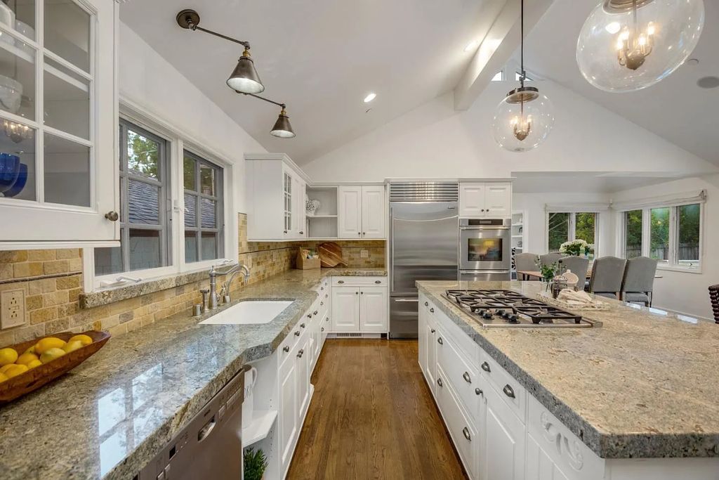 18544 Beck Ave, Monte Sereno, California is a beautifully remodeled house nestled among majestic oak and pine trees with both natural & manicured landscape offers a serene setting and Bay views.