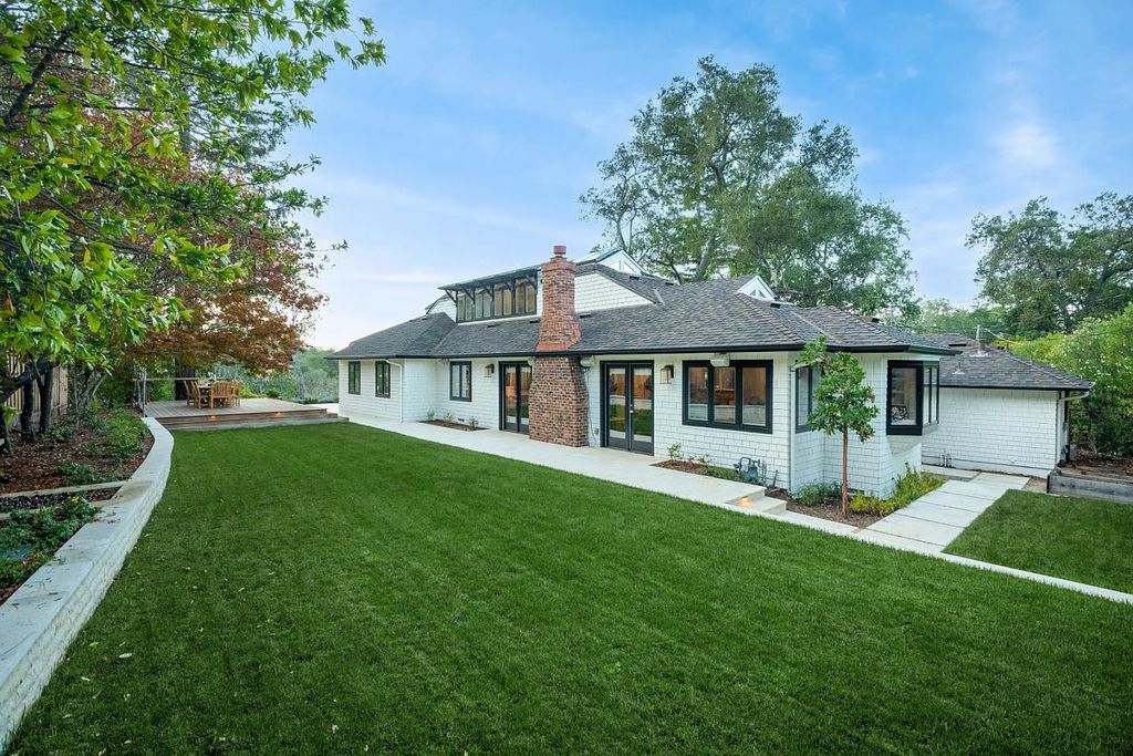 18544 Beck Ave, Monte Sereno, California is a beautifully remodeled house nestled among majestic oak and pine trees with both natural & manicured landscape offers a serene setting and Bay views.