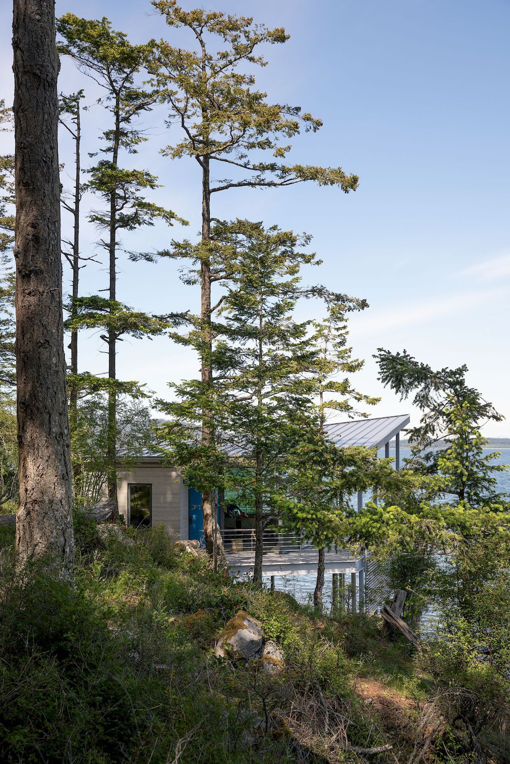 Boathouse, prominent on the sea by Prentiss+Balance+Wickline Architects