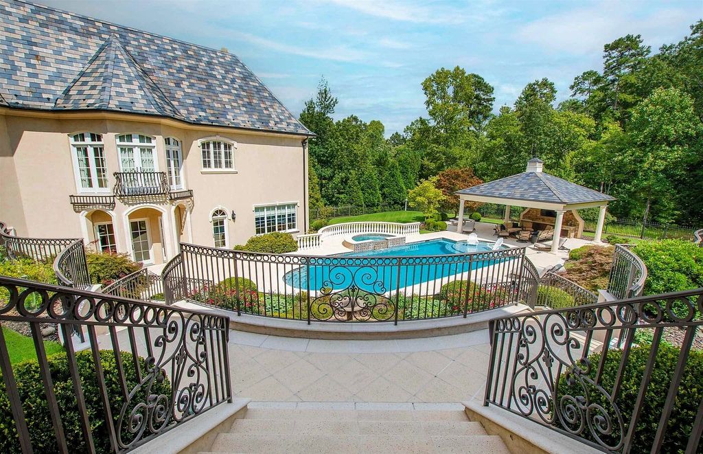 The Estate in Durham is nothing short of magnificent…spacious verandas, multi-level terraces, a seductive pool and spa, now available for sale. This home located at 250 Blue Violet Way, Durham, North Carolina