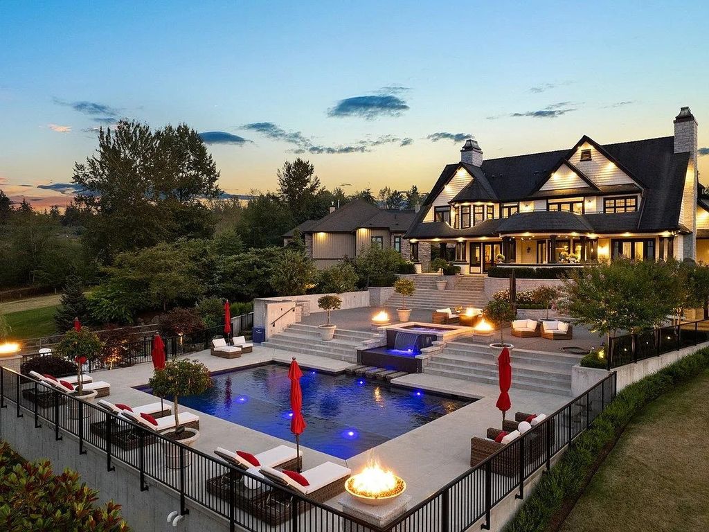 The Estate in Langley is a luxurious home boasting spectacular views of the Coastal Mountains and Campbell Valley Park now available for sale. This home located at 20339 2nd Ave, Langley, BC V2Z 0A3, Canada; offering 06 bedrooms and 06 bathrooms with 7,113 square feet of living spaces. 