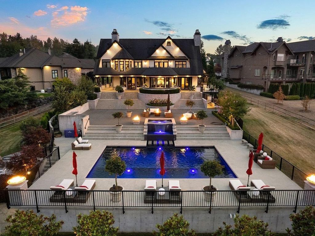 The Estate in Langley is a luxurious home boasting spectacular views of the Coastal Mountains and Campbell Valley Park now available for sale. This home located at 20339 2nd Ave, Langley, BC V2Z 0A3, Canada; offering 06 bedrooms and 06 bathrooms with 7,113 square feet of living spaces. 