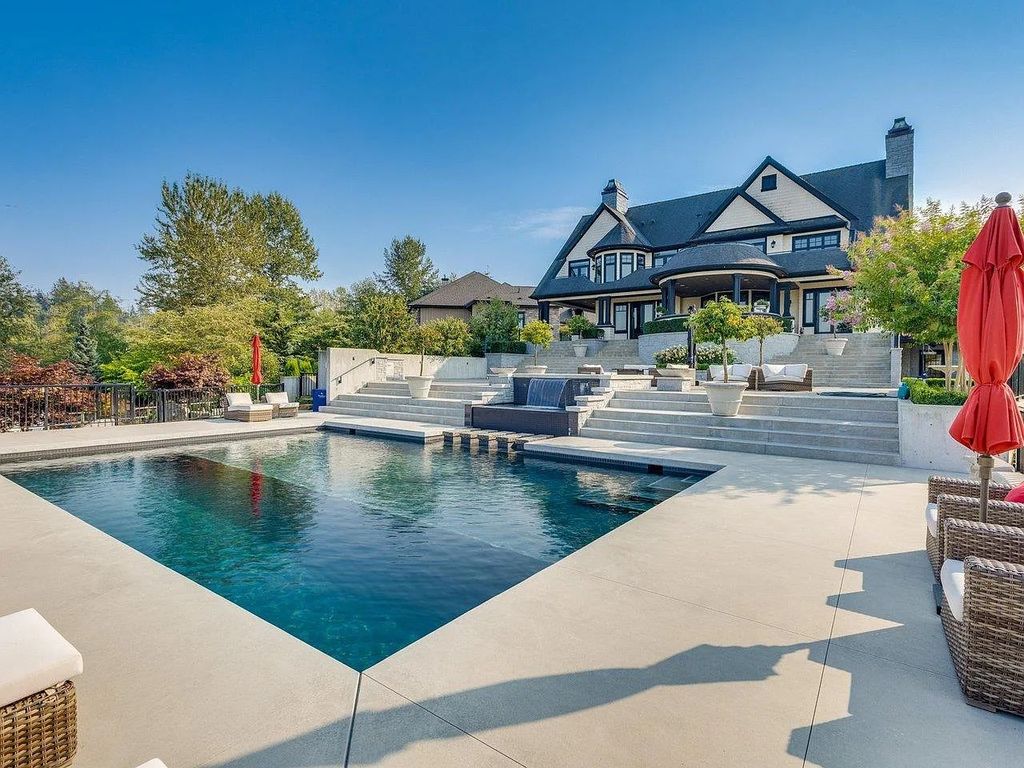 The Estate in Langley is a luxurious home boasting spectacular views of the Coastal Mountains and Campbell Valley Park now available for sale. This home located at 20339 2nd Ave, Langley, BC V2Z 0A3, Canada; offering 06 bedrooms and 06 bathrooms with 7,113 square feet of living spaces. 