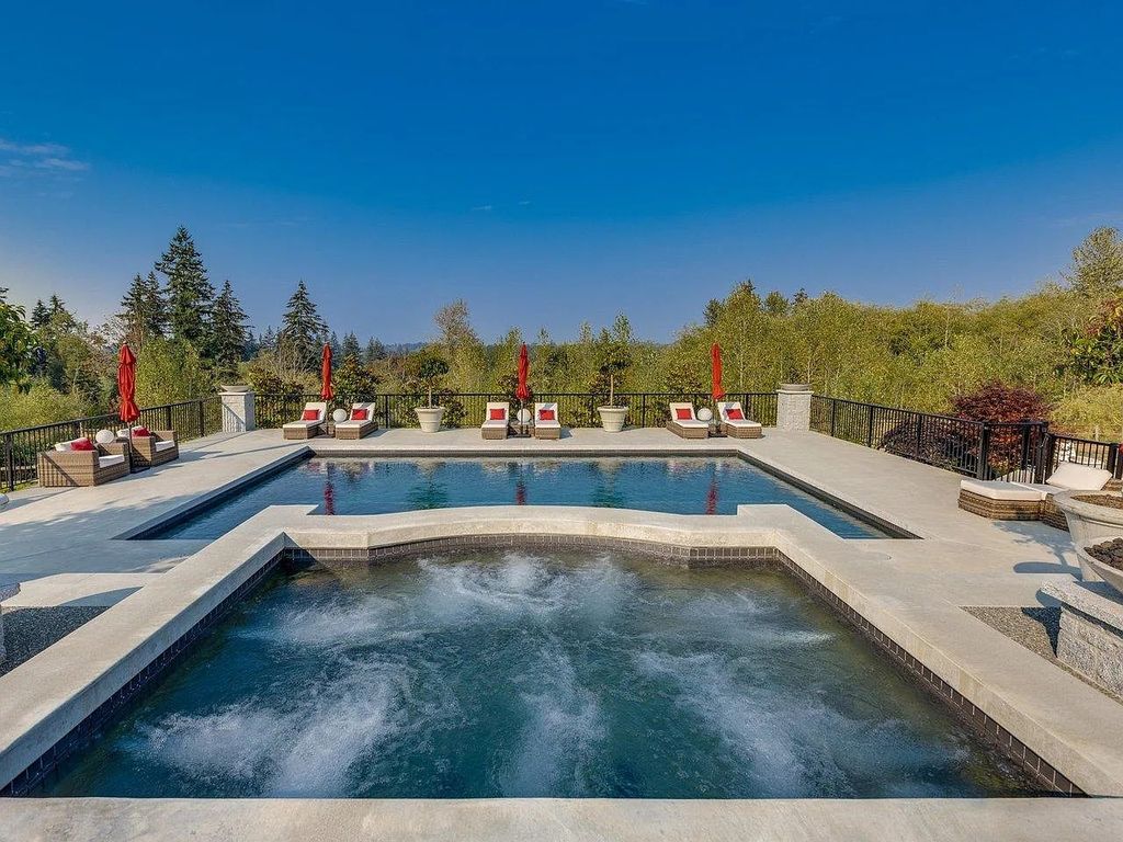 The Estate in Langley is a luxurious home boasting spectacular views of the Coastal Mountains and Campbell Valley Park now available for sale. This home located at 20339 2nd Ave, Langley, BC V2Z 0A3, Canada; offering 06 bedrooms and 06 bathrooms with 7,113 square feet of living spaces. 