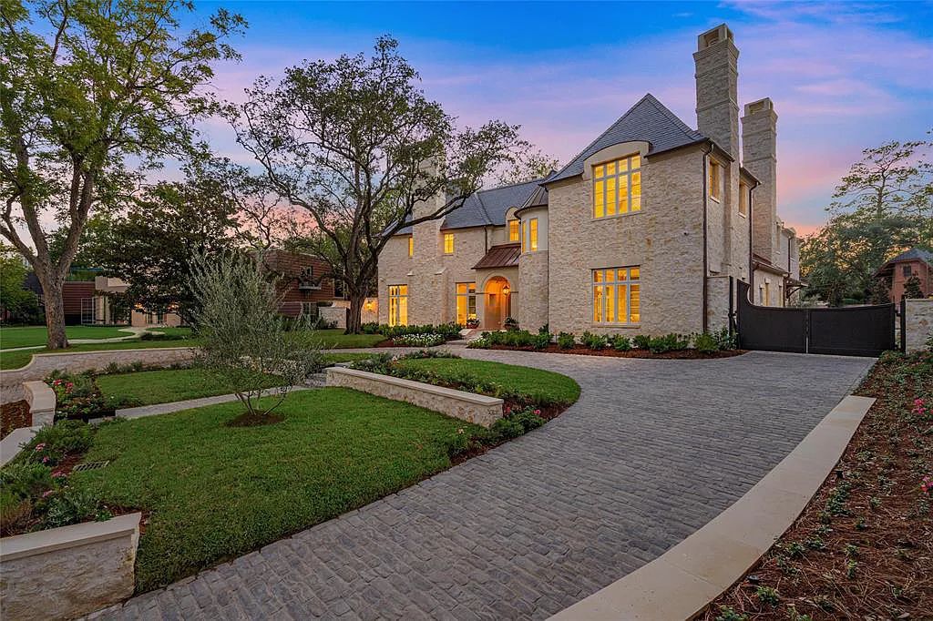 2445 Pine Valley Court, Houston, Texas is a European style estate designed by Jennifer Hamelet of Mirador Builders with exquisite interior exterior spaces enhanced by beautiful views of bucolic gardens, the pool and pavilion.