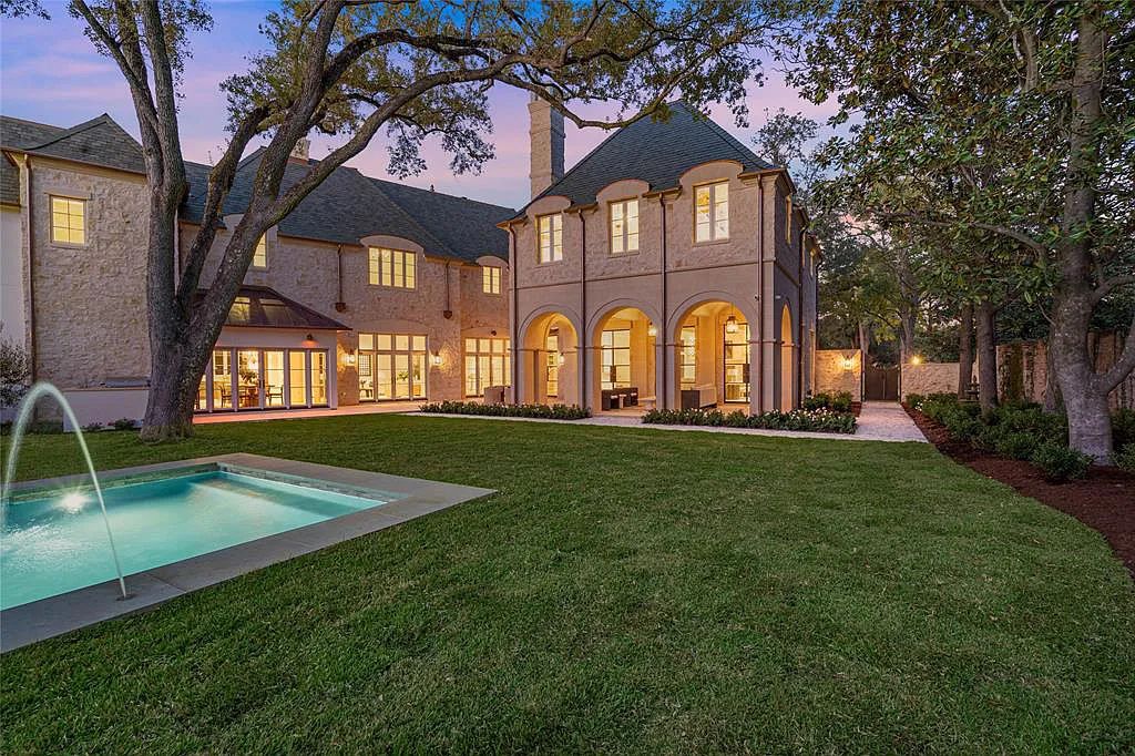 2445 Pine Valley Court, Houston, Texas is a European style estate designed by Jennifer Hamelet of Mirador Builders with exquisite interior exterior spaces enhanced by beautiful views of bucolic gardens, the pool and pavilion.