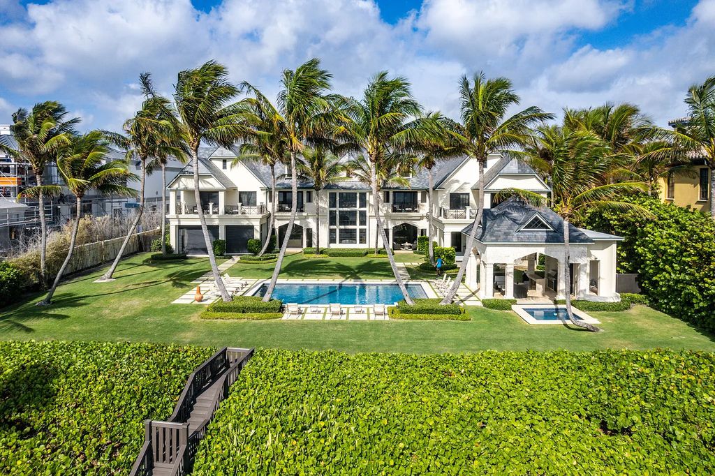 The Mansion in Highland Beach, a trophy property delivers over 150 feet of private manicured beachfront  on nearly 2 acres featuring modern French-Eclectic architecture, transitional interiors is now available for sale. This home located at 2455 S Ocean Blvd, Highland Beach, Florida