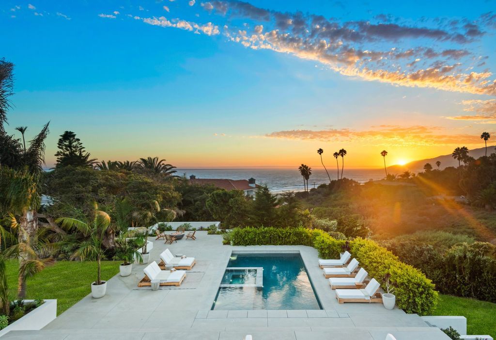 The Home in Malibu, a brand new architectural estate with breathtaking ocean and mountain views from every room and seamless flow from expansive interiors to resort-style decks and patios is now available for sale. This home located at 30227 Pacific Coast Hwy, Malibu, California