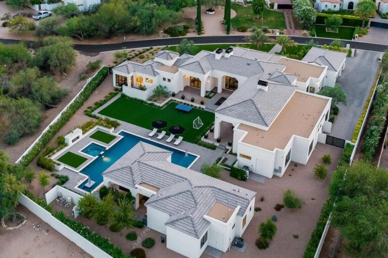 Just Listed for $9.5 Million, This Incredibly Luxurious Mediterranean Home comes with A Resort Style Giant Heated Pool in Paradise Valley, Arizona