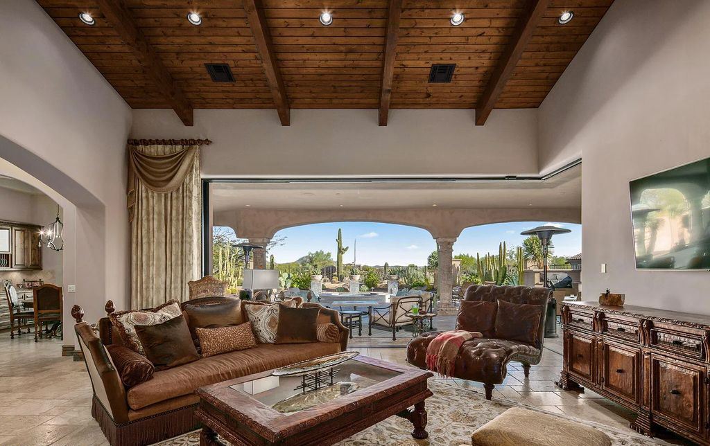 The Home in Scottsdale, a landmark masterpiece on one of the best view lots in Mirabel with sweeping golf course lake, fairway, green complex, mountain and sunset views from the backyard is now available for sale. This home located at 10265 E Aniko Dr, Scottsdale, Arizona
