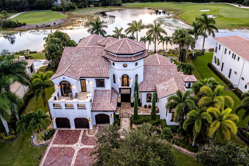 The Home in Parkland, a magnificent mini mansion with a beautiful backyard overlooking rolling fairways, tranquil water and stunning pool area is now available for sale. This home located at 7235 Lemon Grass Dr, Parkland, Florida