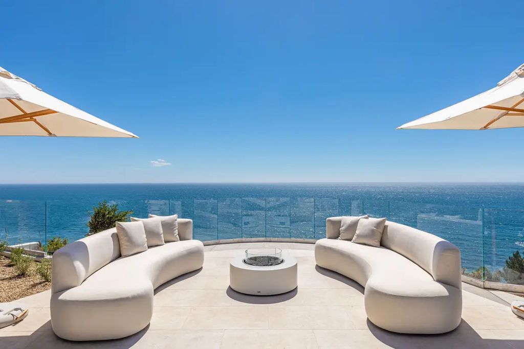 The Home in Malibu, a private ocean view retreat on the prized Malibu Bluffs has been fully reimagined by renowned celebrity designer Malgosia Migdal and noteworthy Fun-Bu Developers enjoying a prime Malibu location in the ''Celebrity Bluff Row'' is now available for sale. This home located at 24824 Pacific Coast Hwy, Malibu, California