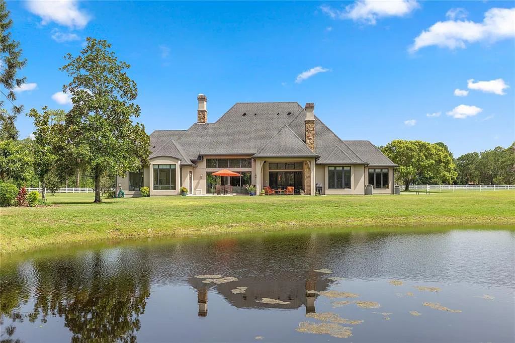 1251 Ranch Road, Tarpon Springs, Florida is a truly one of a kind estate surrounded by the largest natural preserve in Pinellas County spanning over 8700 acres of protected land creating ultimate privacy.