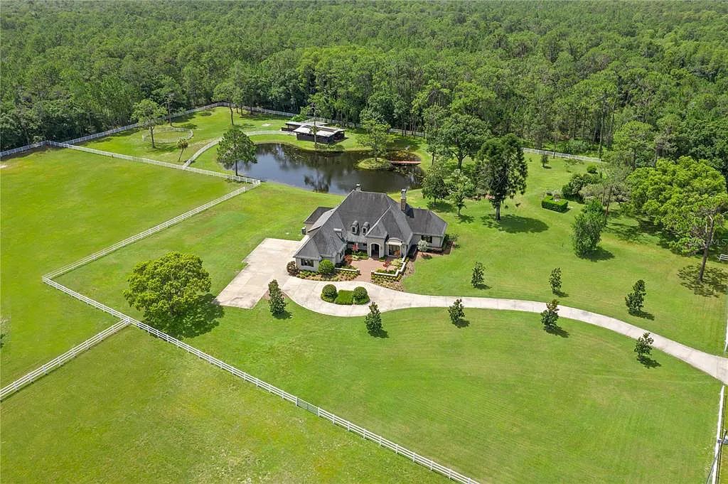 1251 Ranch Road, Tarpon Springs, Florida is a truly one of a kind estate surrounded by the largest natural preserve in Pinellas County spanning over 8700 acres of protected land creating ultimate privacy.