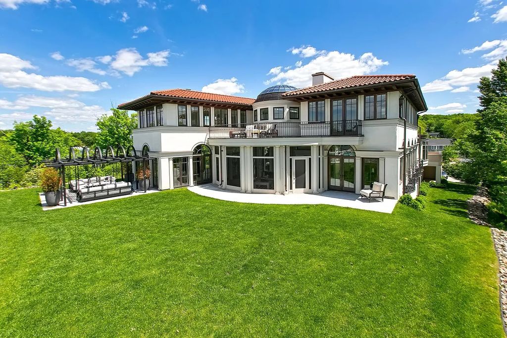 The Estate in Greenwood was thoughtfully designed to create the perfect blend of indoor and outdoor living with French doors leading from the living spacesnow available for sale. This home located at 5570 Maple Heights Rd, Greenwood, Minnesota