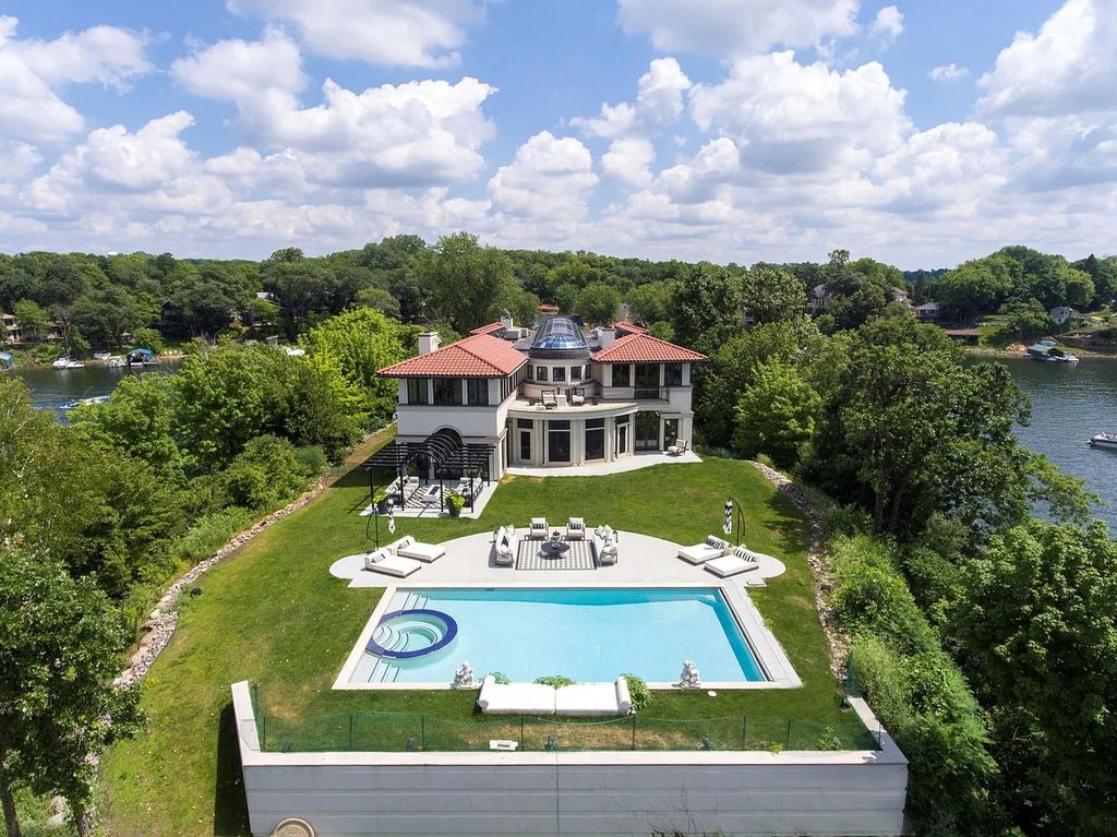 The Estate in Greenwood was thoughtfully designed to create the perfect blend of indoor and outdoor living with French doors leading from the living spacesnow available for sale. This home located at 5570 Maple Heights Rd, Greenwood, Minnesota