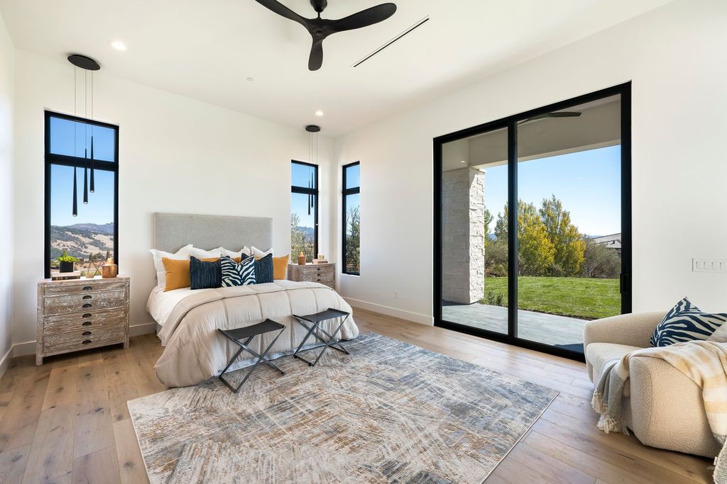 2240 Newgate Ct, Santa Rosa, California is an newly built exceptional house offers sweeping city light views over the resort style rear yard and the mountains beyond.