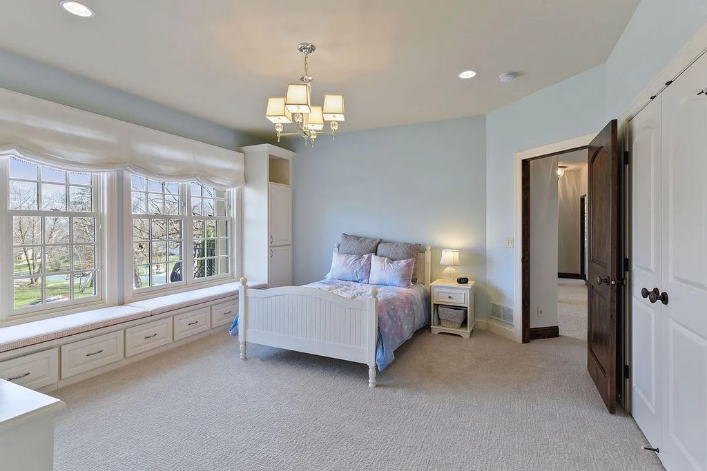 The Home in Edina is an entertainer's dream with amenities such as a wet bar, wine cellar, theater room,  now available for sale. This home located at 5504 Schaefer Rd, Edina, Minnesota