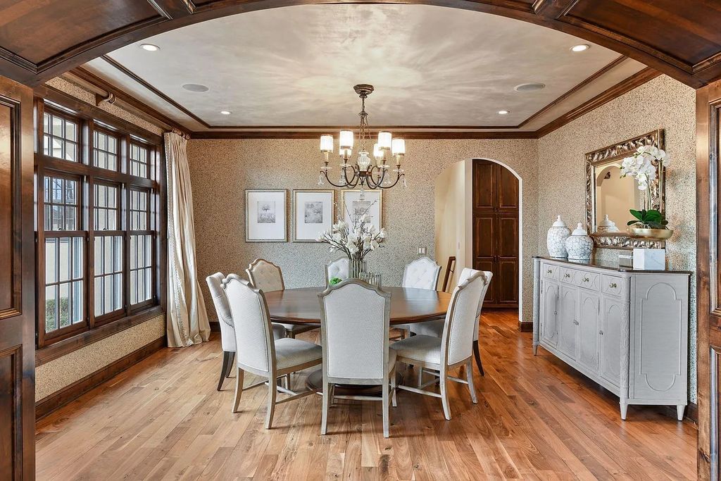 The Home in Edina is an entertainer's dream with amenities such as a wet bar, wine cellar, theater room,  now available for sale. This home located at 5504 Schaefer Rd, Edina, Minnesota