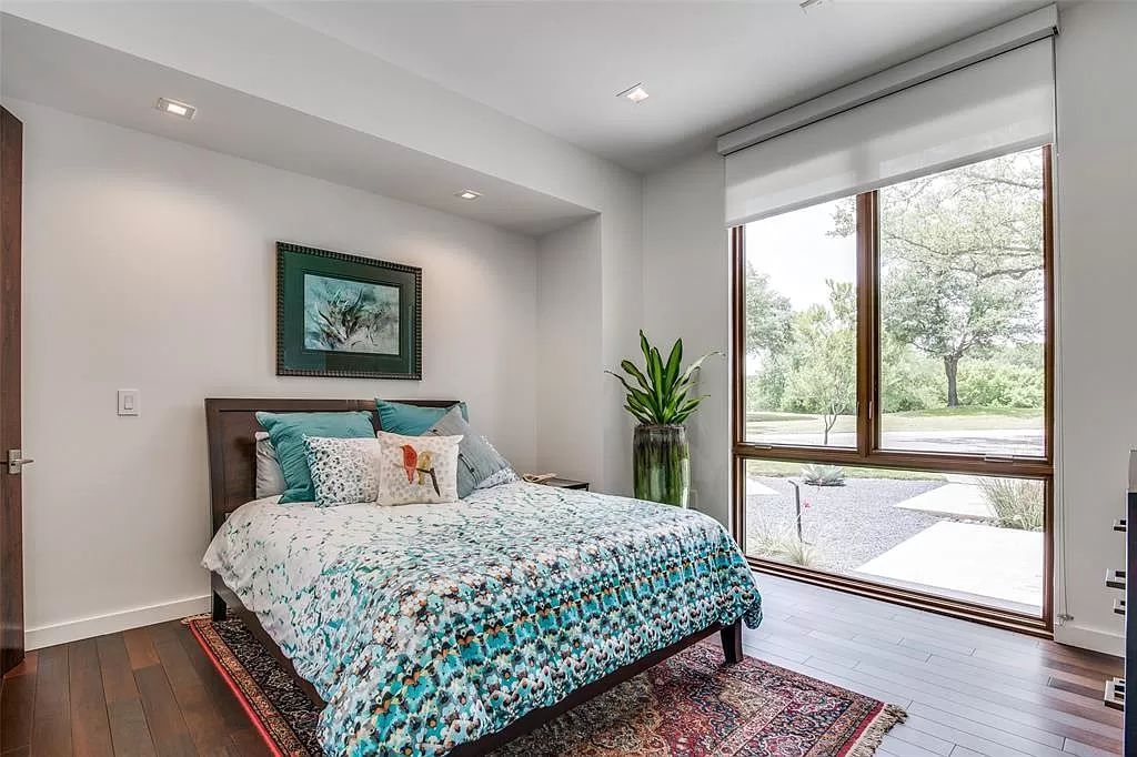 17214 Club Hill Drive, Dallas, Texas is a modern masterpiece perfectly situated with pristine views of both the Bent Tree & Preston Trail Golf courses along with its picturesque view of White Rock Creek.