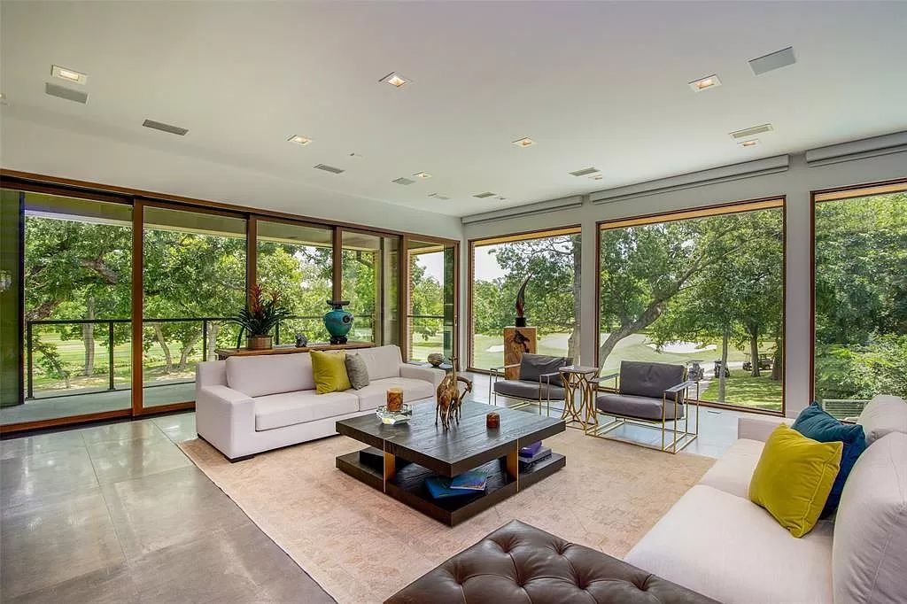 17214 Club Hill Drive, Dallas, Texas is a modern masterpiece perfectly situated with pristine views of both the Bent Tree & Preston Trail Golf courses along with its picturesque view of White Rock Creek.