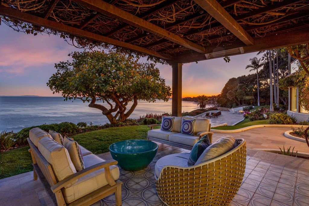 The Estate in Malibu, an exceptional property on the bluffs of the world-renowned Paradise Cove Beach offers destination resort-style living with a gorgeous infinity pool, a tennis court, outdoor barbeque and pizza oven and more is now available for sale. This home located at 28060 Sea Lane Dr, Malibu, California