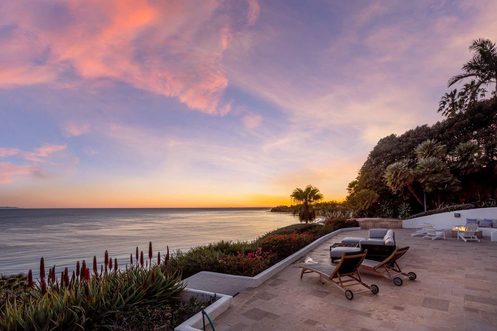 The Estate in Malibu, an exceptional property on the bluffs of the world-renowned Paradise Cove Beach offers destination resort-style living with a gorgeous infinity pool, a tennis court, outdoor barbeque and pizza oven and more is now available for sale. This home located at 28060 Sea Lane Dr, Malibu, California