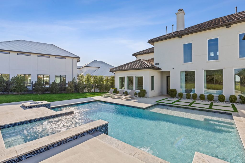 2059 Lilac Ln, Frisco, Texas is a contemporary Mediterranean estate on almost an acre lot in gated Hills of Kingswood comfortable with a thoughtful floor plan & architectural details making entertaining or relaxing easy.