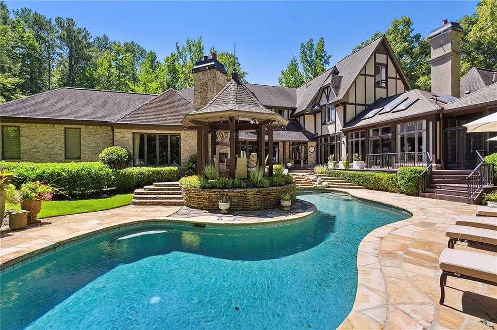 The Estate in Marietta is a luxurious home featuring a spacious formal living room and a private tennis court now available for sale. This home located at 1638 Little Willeo Rd, Marietta, Georgia; offering 05 bedrooms and 09 bathrooms with 9,558 square feet of living spaces.