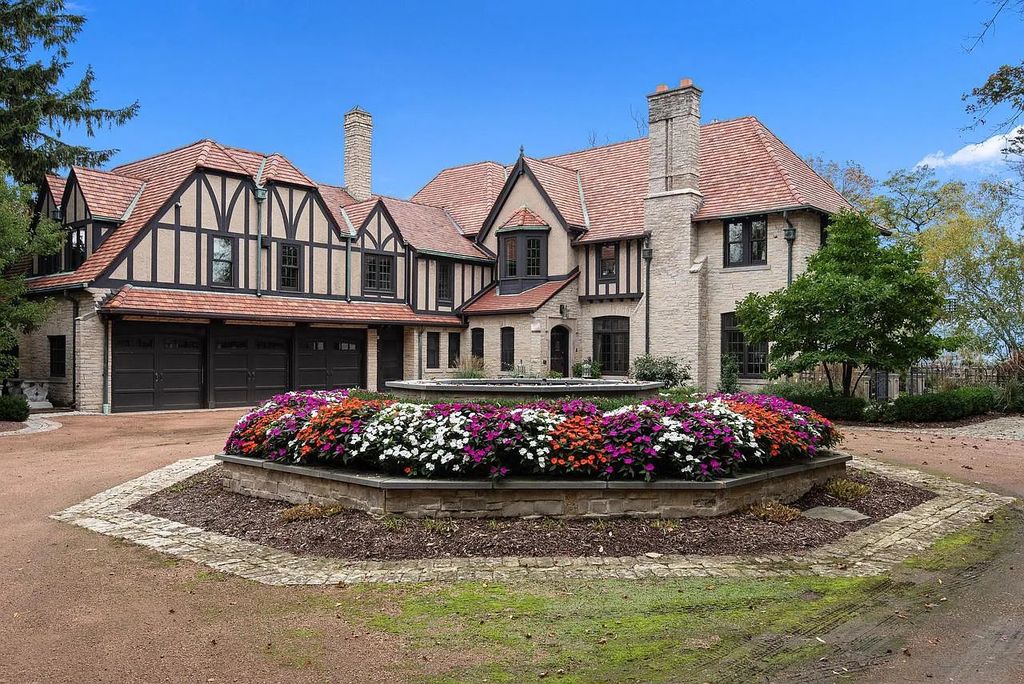 The Mansion in Shorewood offers beautiful backyard with outdoor granite Kit, pergola dining area and Firepit, now available for sale. This home located at 4496 North Lake Dr, Shorewood, Wisconsin