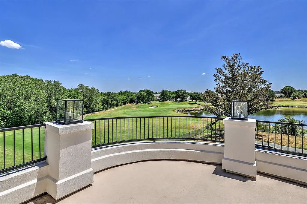 5801 Cypress Point Dr, Fort Worth, Texas is stunning remodeled estate in guarded and gated Mira Vista community on a cul-de-sac lot overlooking the 7th tee box, green and lake.