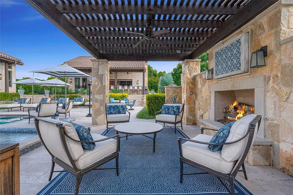 The Home in Flower Mound, a Spanish Mediterranean custom estate on two acres in exclusive gated community was built sparing no expense with a open floor plan that flows seamlessly is now available for sale. This home located at 2105 La Rochelle, Flower Mound, Texas
