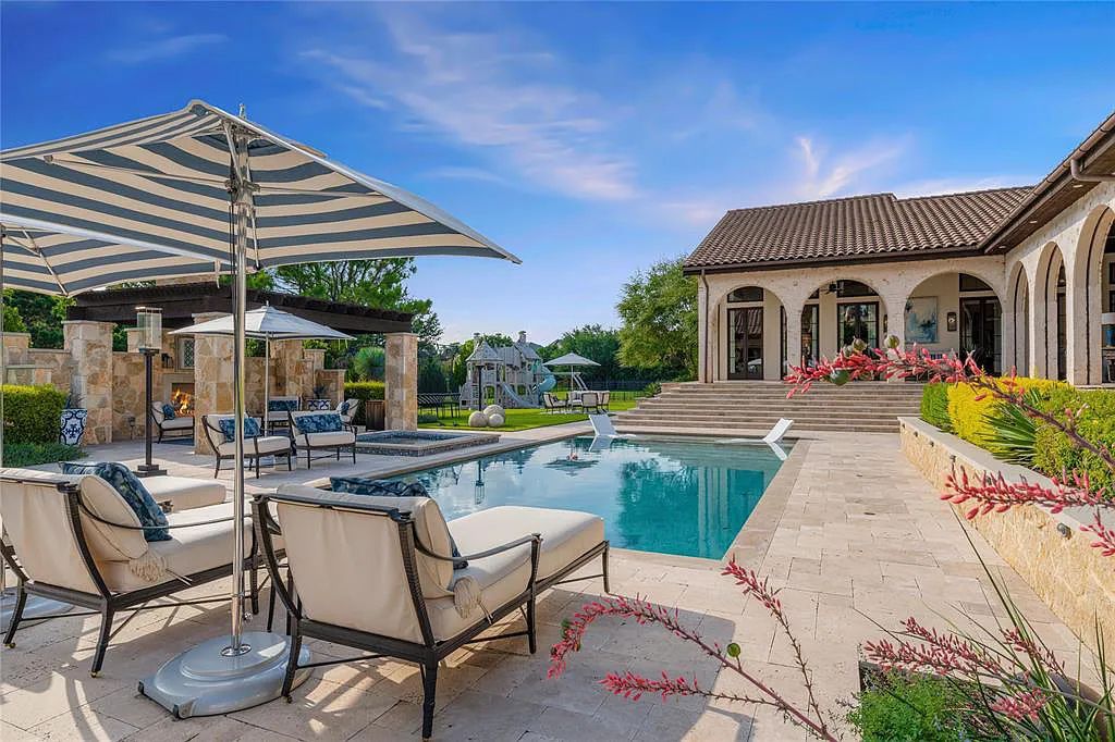 The Home in Flower Mound, a Spanish Mediterranean custom estate on two acres in exclusive gated community was built sparing no expense with a open floor plan that flows seamlessly is now available for sale. This home located at 2105 La Rochelle, Flower Mound, Texas