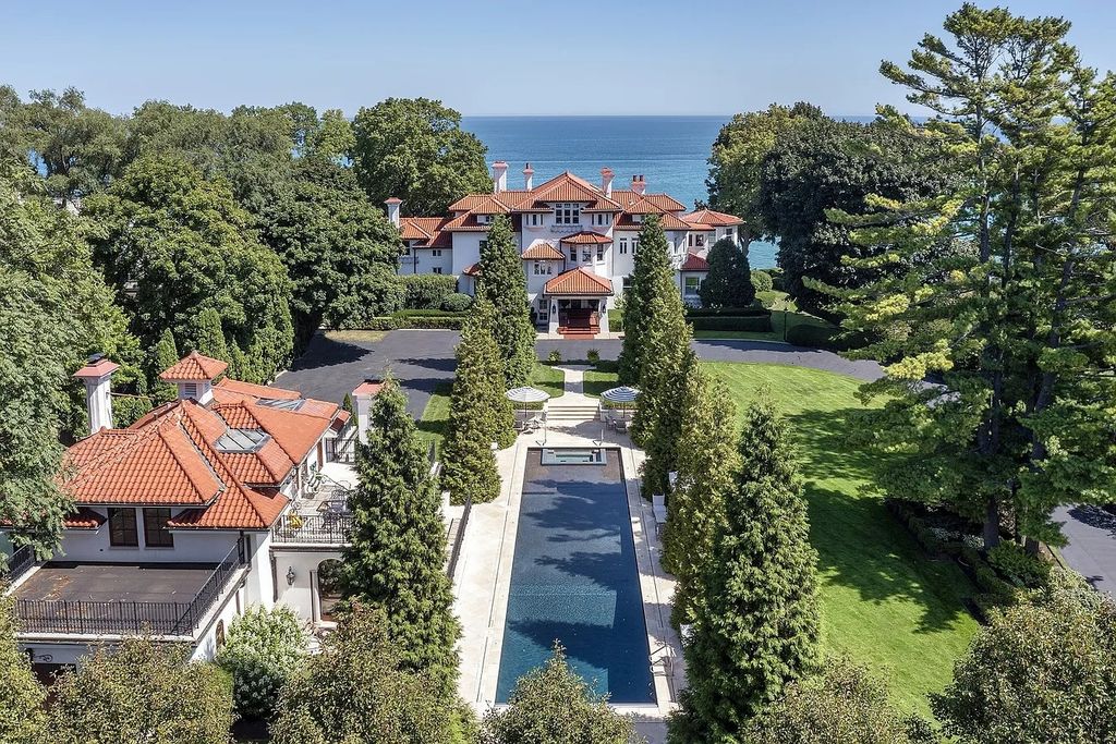 The Villa in Winnetka features incredible manicured resort level grounds accented with a full 2 story cabana house, now available for sale. This home located at 445 Sheridan Rd, Winnetka, Illinois