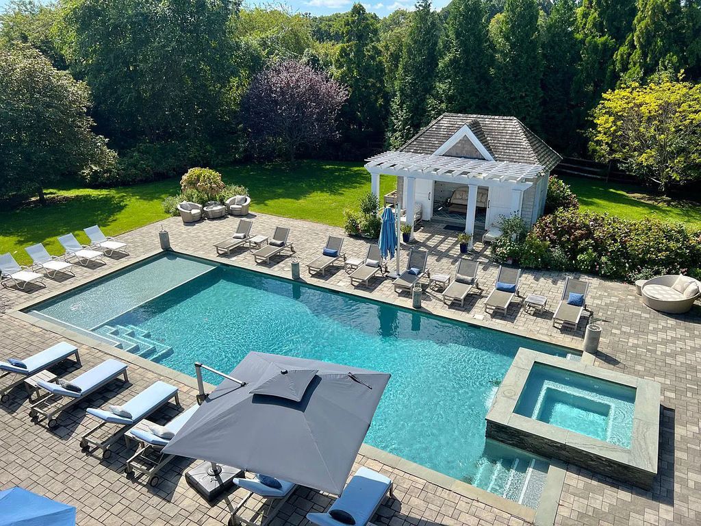 The Estate in Amaganset, an exquisitely timeless home just minutes from East Hampton and Montauk offers masterfully designed outdoor spaces and amazing resort amenities for entertainment is now available for sale. This home located at 10 Saint Marys Lane, Amagansett, New York