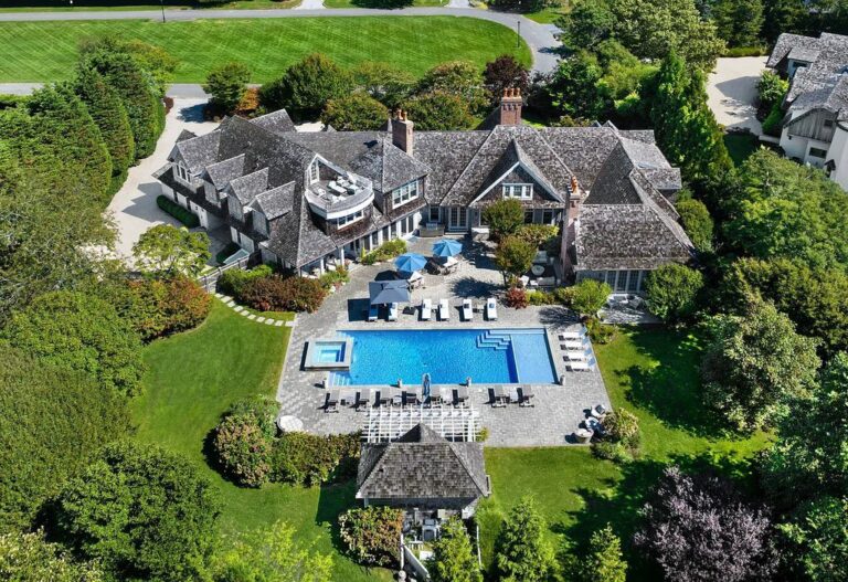 This $15M Timeless Estate in Amaganset showcases nearly 9,000 SF Resort Style Living Surrounded by Exquisitely Landscaped Grounds