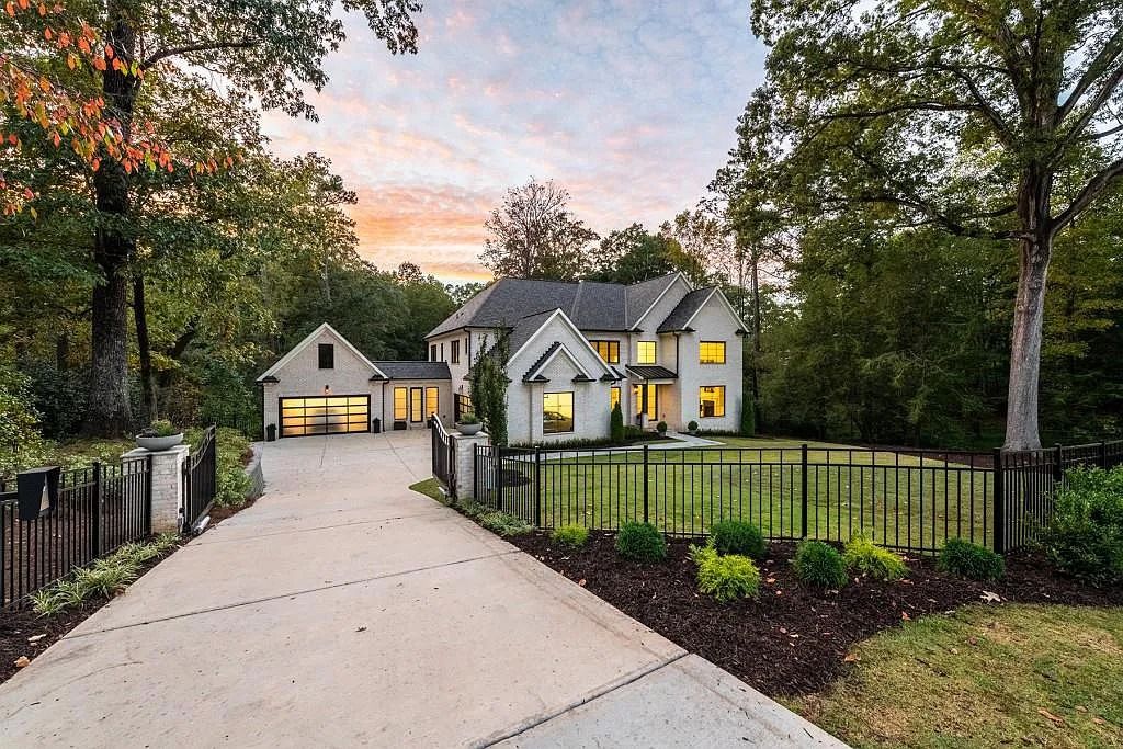 The Property in Atlanta boasts both a main & upper-level luxurious, primary suite, an elevator, hard to find 5 car, now available for sale. This home located at 4220 Harris Trl NW, Atlanta, Georgia