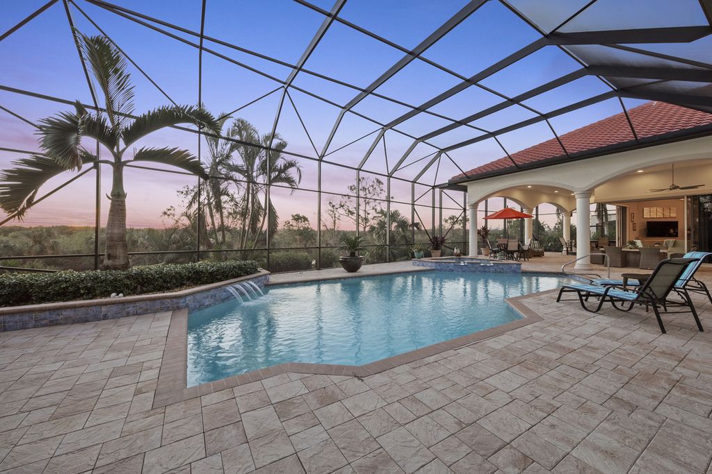 208 Audubon Boulevard, Naples, Florida is a beautiful estate designed for living life to the fullest and capable of accommodating a large family or multiple guests in total comfort.