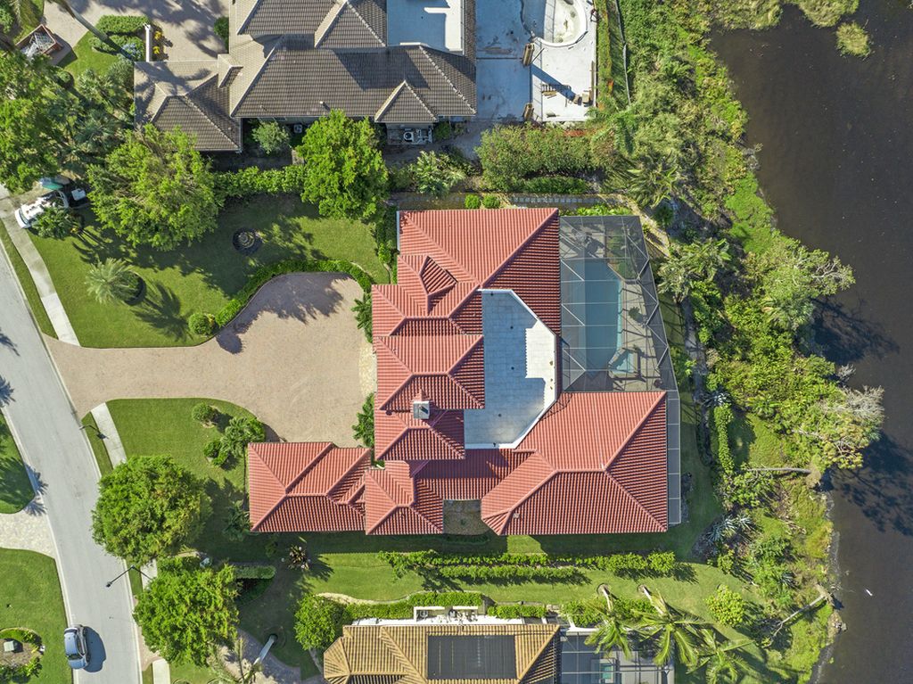 208 Audubon Boulevard, Naples, Florida is a beautiful estate designed for living life to the fullest and capable of accommodating a large family or multiple guests in total comfort.