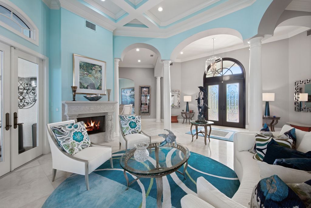 208 Audubon Boulevard, Naples, Florida is a beautiful estate designed for living life to the fullest and capable of accommodating a large family or multiple guests in total comfort.