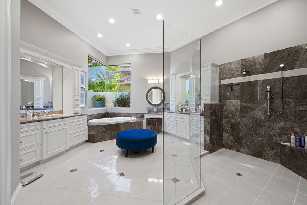 208 Audubon Boulevard, Naples, Florida is a beautiful estate designed for living life to the fullest and capable of accommodating a large family or multiple guests in total comfort.