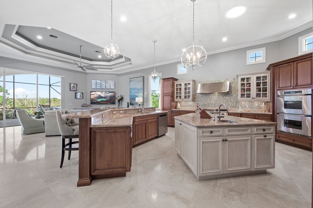 208 Audubon Boulevard, Naples, Florida is a beautiful estate designed for living life to the fullest and capable of accommodating a large family or multiple guests in total comfort.