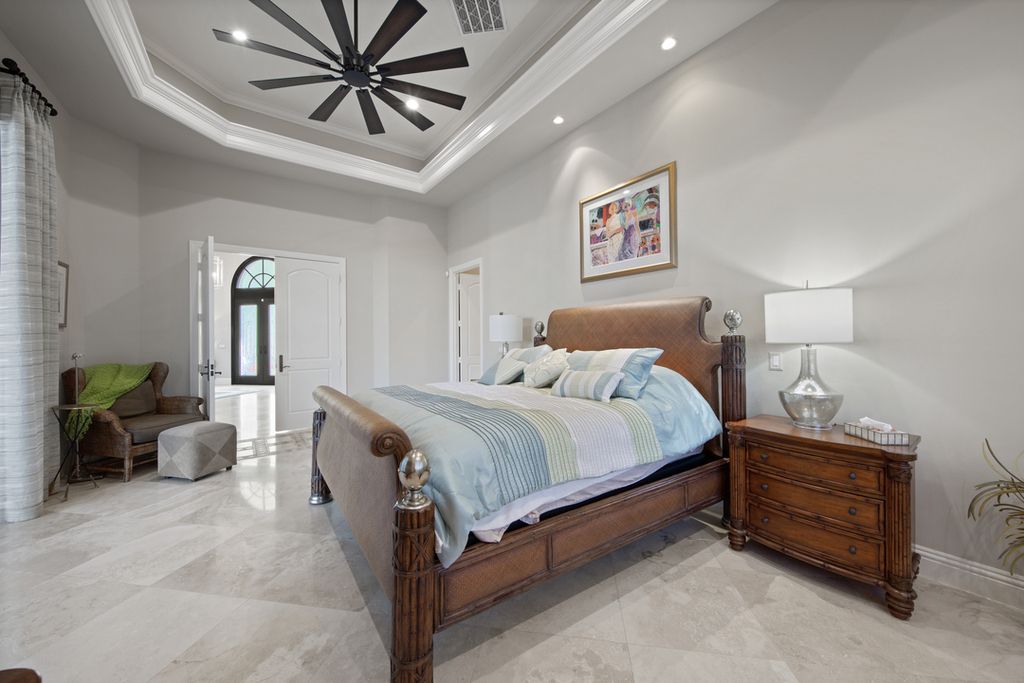 208 Audubon Boulevard, Naples, Florida is a beautiful estate designed for living life to the fullest and capable of accommodating a large family or multiple guests in total comfort.