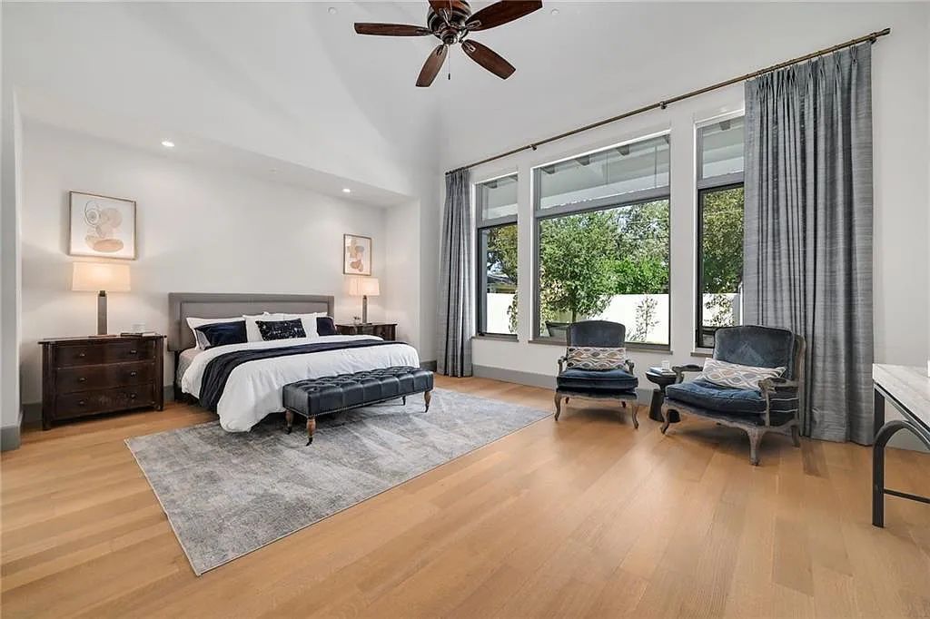 The Home in Austin, an immaculate modern estate nestled in the peaceful and tree-filled neighborhood of Rollingwood features resort-style backyard with a pool and spa, a covered outdoor kitchen is now available for sale. This home located at 4713 Timberline Dr, Austin, Texas