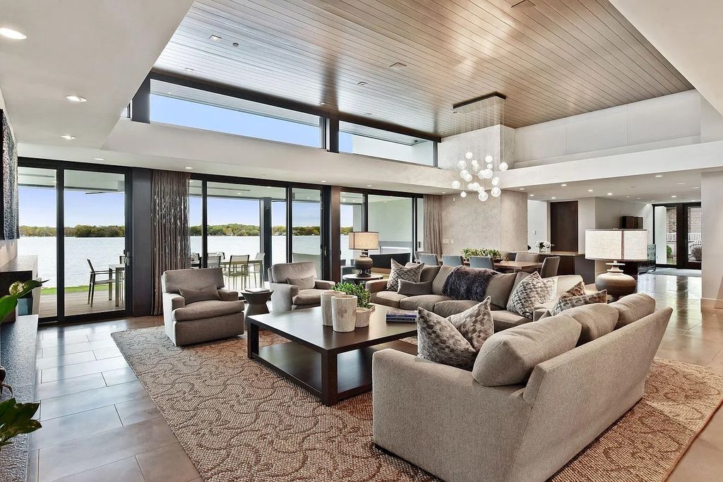 The Residence in Tonka Bay offers expansive 180-degree views of Lake Minnetonka with 233' of frontage, now available for sale. This home located at 275 Lakeview Ave, Tonka Bay, Minnesota