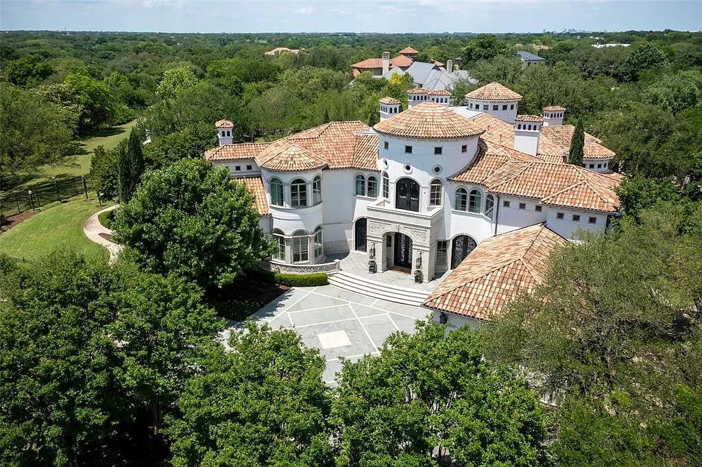 5969 Westgrove Circle, Dallas, Texas is a masterpiece captivates at every turn with three gorgeous fountains spread throughout the lush, mature trees, multiple covered patios, cabana and pool.