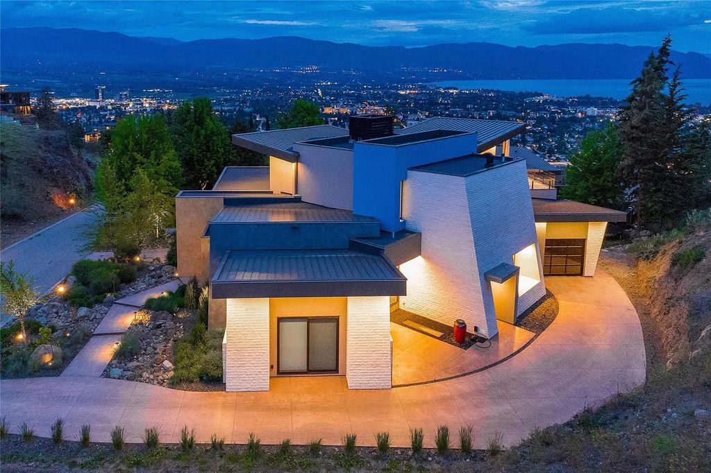 The House in Kelowna is an architectural dream house in the most exclusive private gated community, now available for sale. This home located at 732 Highpointe Pl, Kelowna, BC V1V 2Y3, Canada