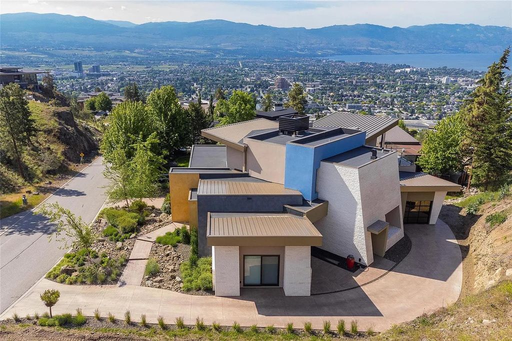 The House in Kelowna is an architectural dream house in the most exclusive private gated community, now available for sale. This home located at 732 Highpointe Pl, Kelowna, BC V1V 2Y3, Canada